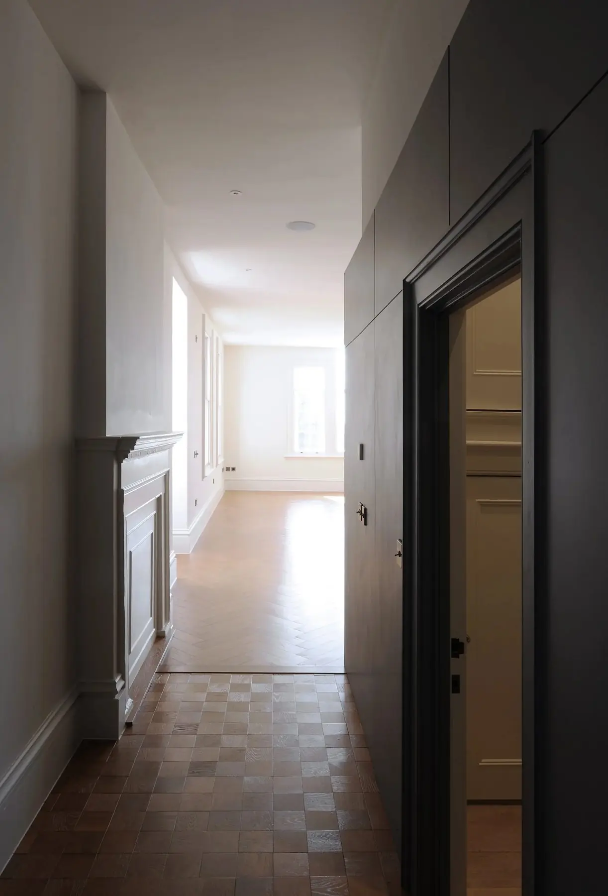 Hallway with encaustic tiles and restored joinery